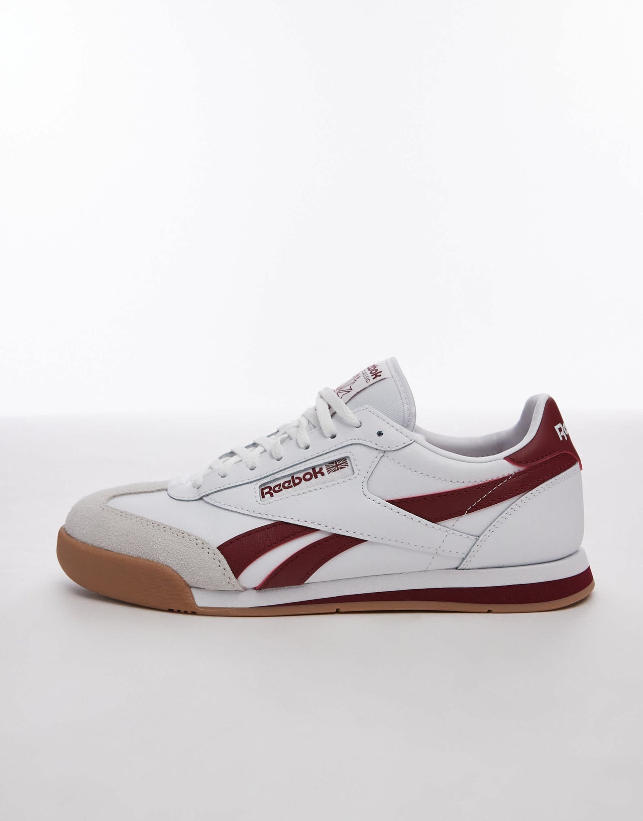 Reebok Campio XT trainers in white and burgundy