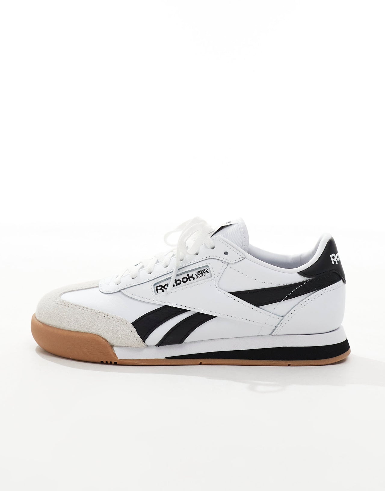 Rebook Campio XT trainers in white and black