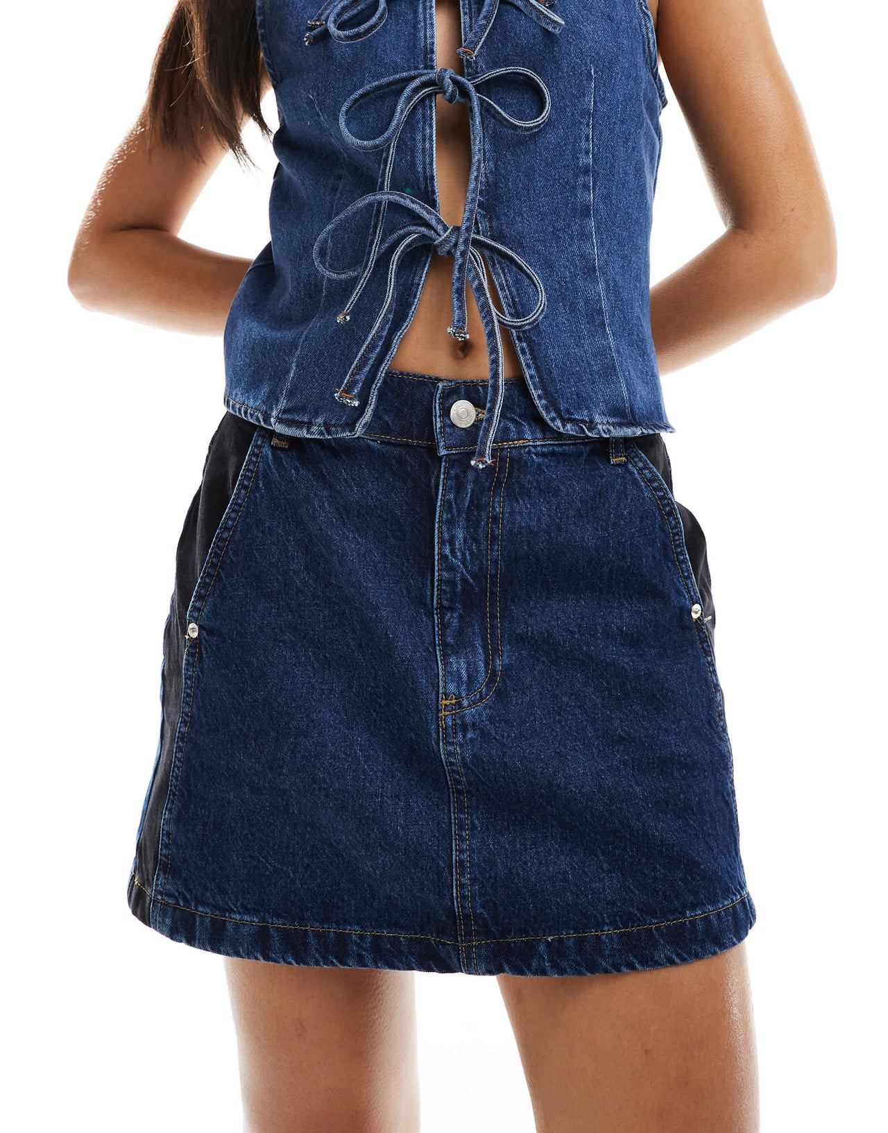 ASOS DESIGN denim mini skirt with contrast panels in blue and black