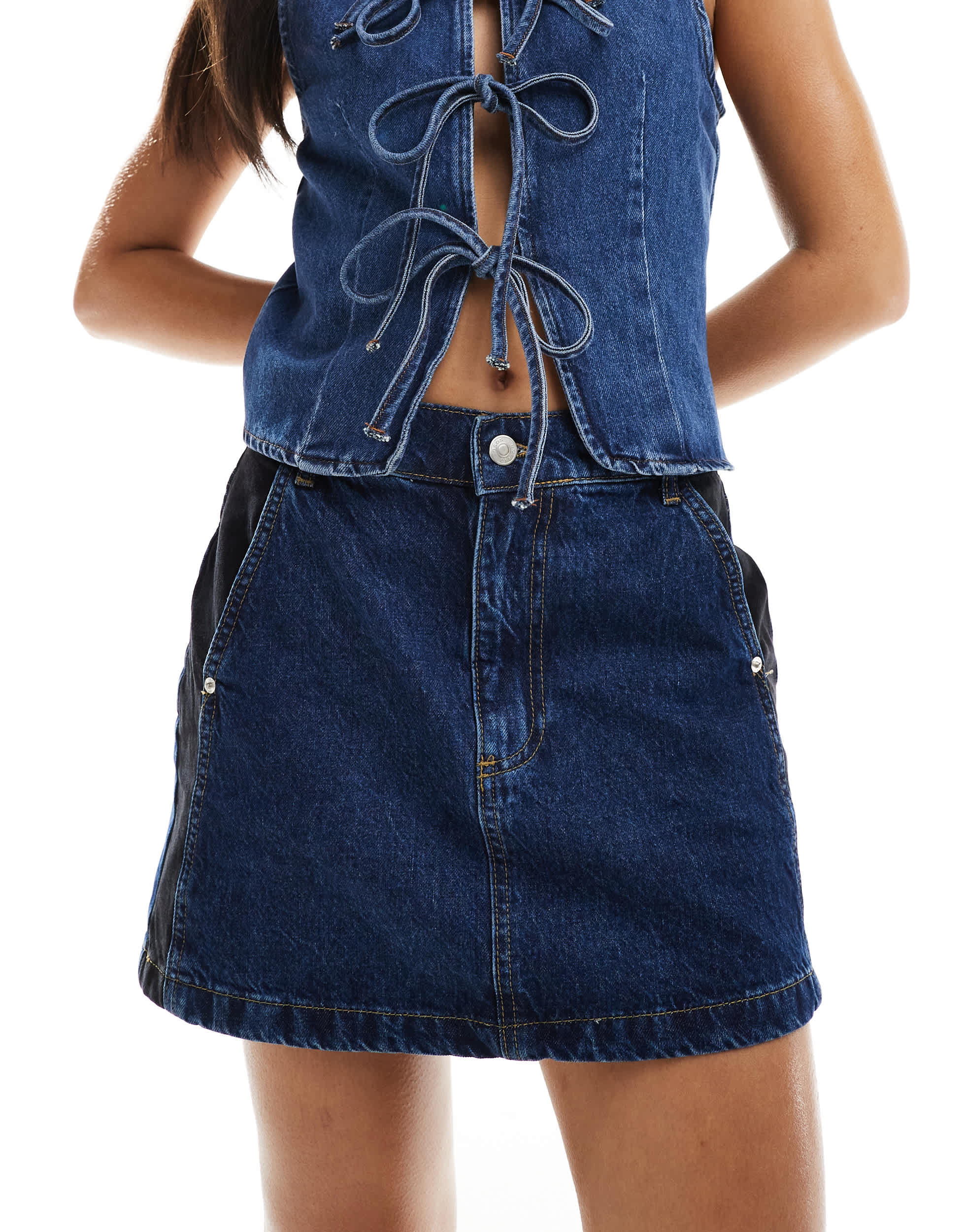 ASOS DESIGN denim mini skirt with contrast panels in blue and black