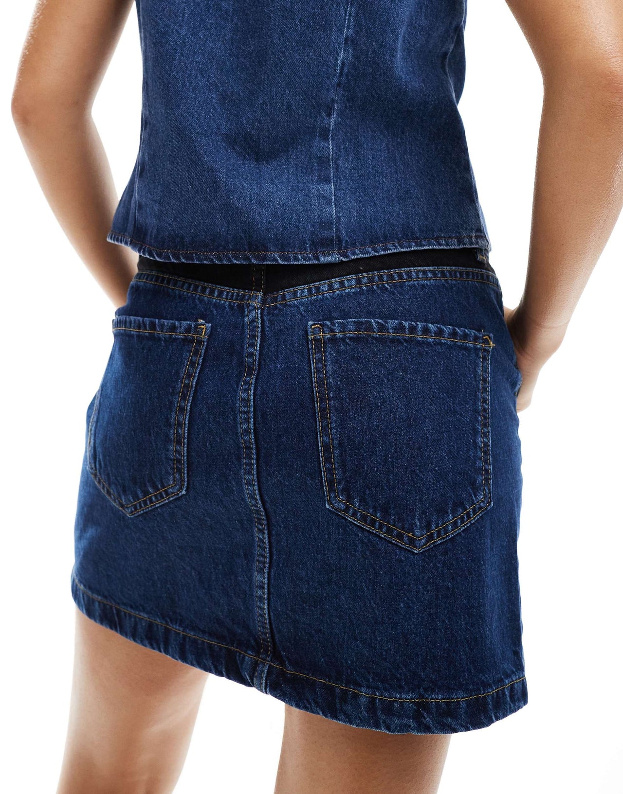 ASOS DESIGN denim mini skirt with contrast panels in blue and black