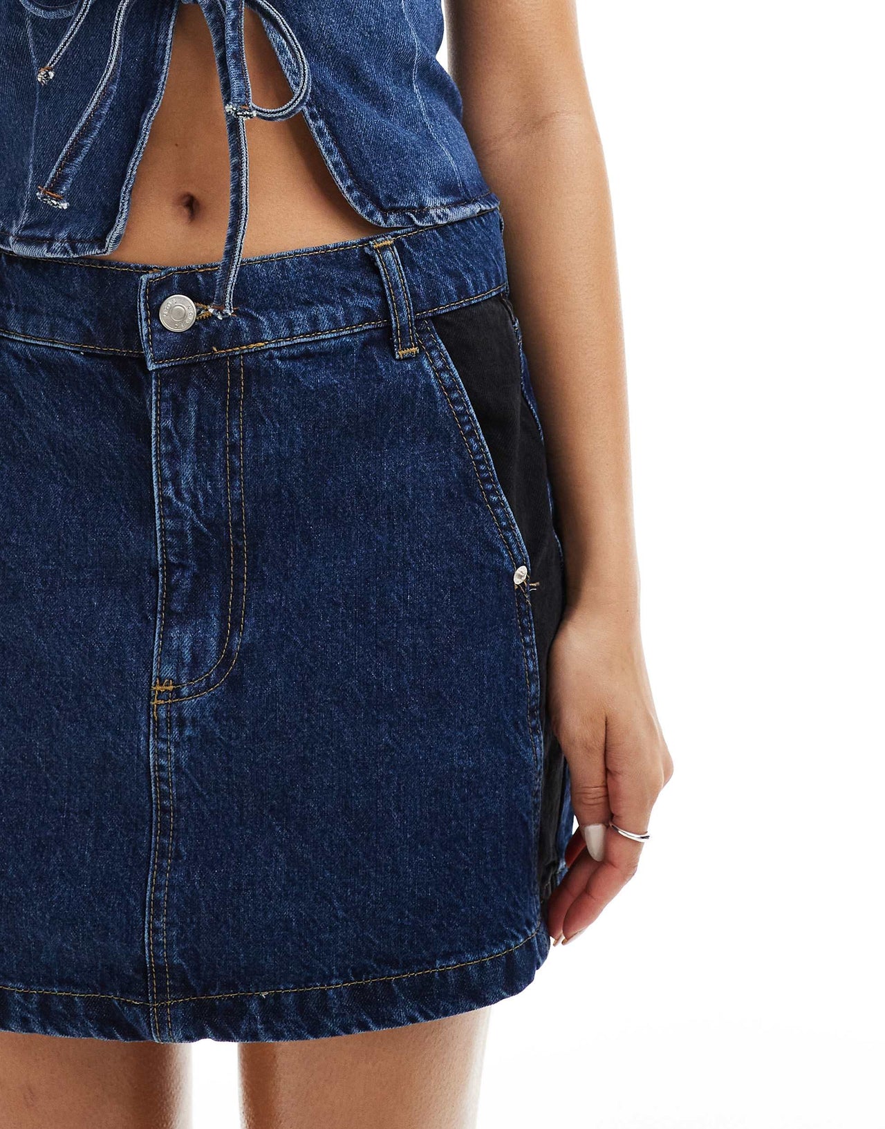 ASOS DESIGN denim mini skirt with contrast panels in blue and black