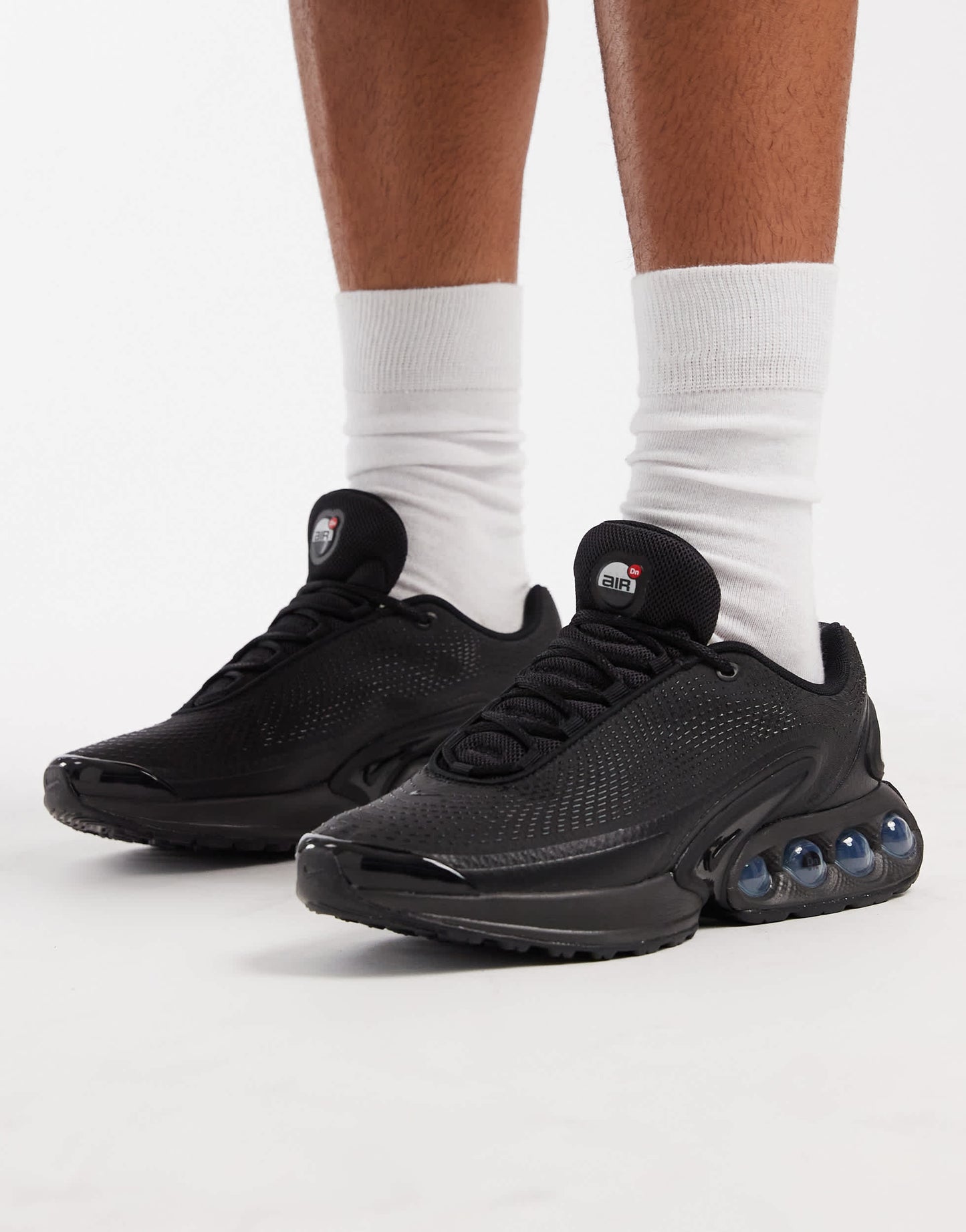 Nike Air Max DN trainers in black