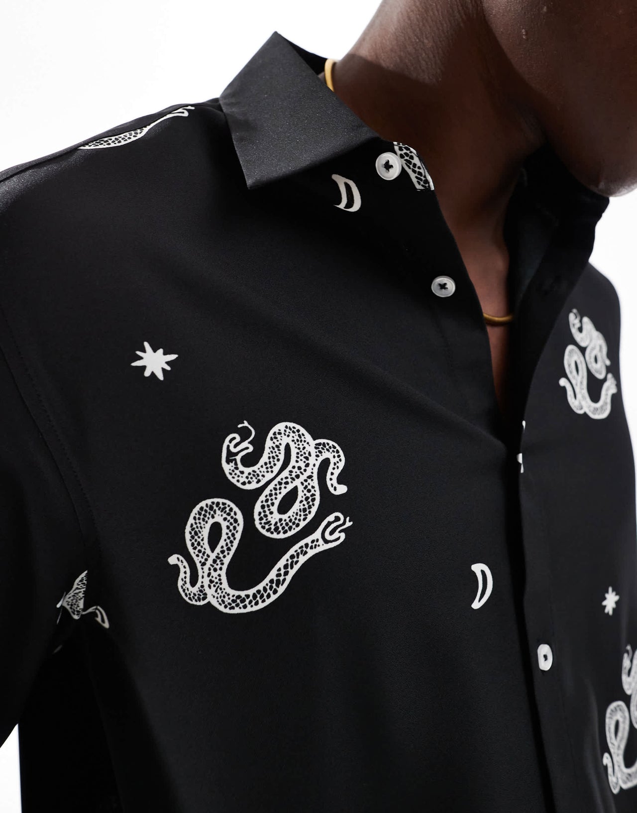 ASOS DESIGN relaxed shirt with snake print in black