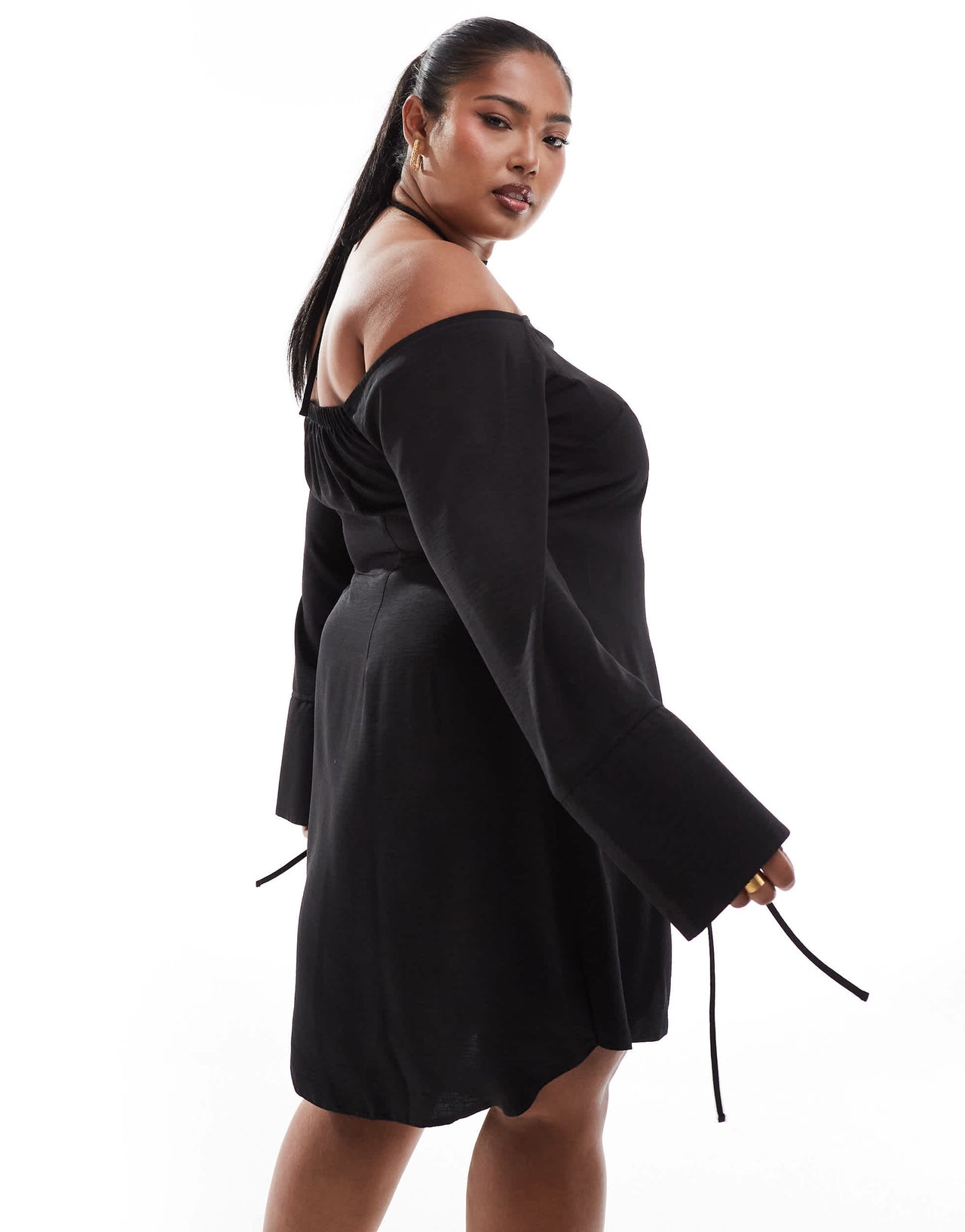 ASOS DESIGN Curve off the shoulder halter neck mini dress with curved hem and hardware detail in black