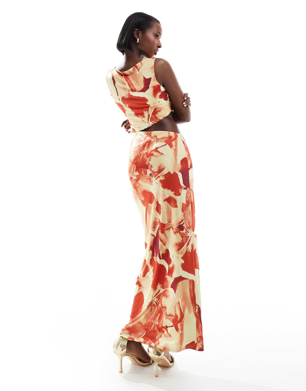 ASOS DESIGN slinky cut out maxi dress in oversized orange floral print