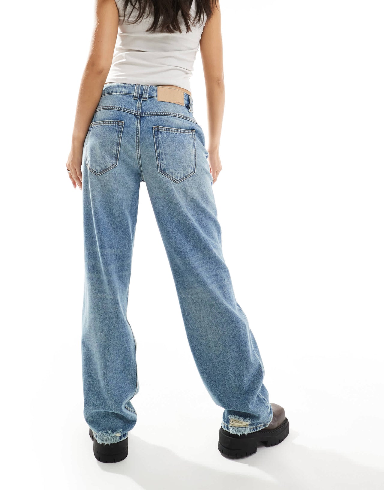 ASOS DESIGN  baggy  jean with rips in mid blue