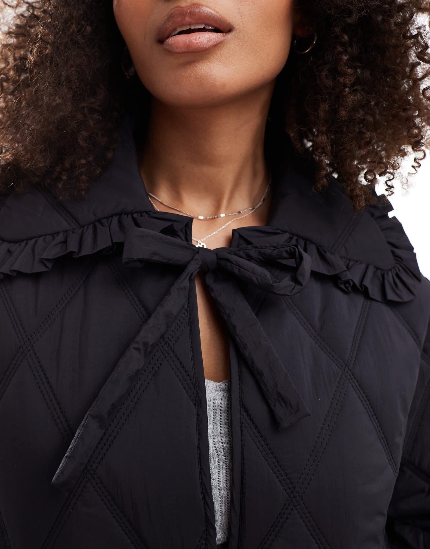 ASOS DESIGN quilted frill collar jacket with tie front in black