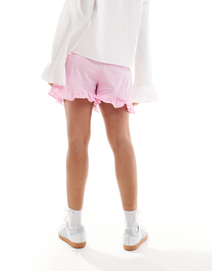ASOS DESIGN cotton frill hem shorts in pink