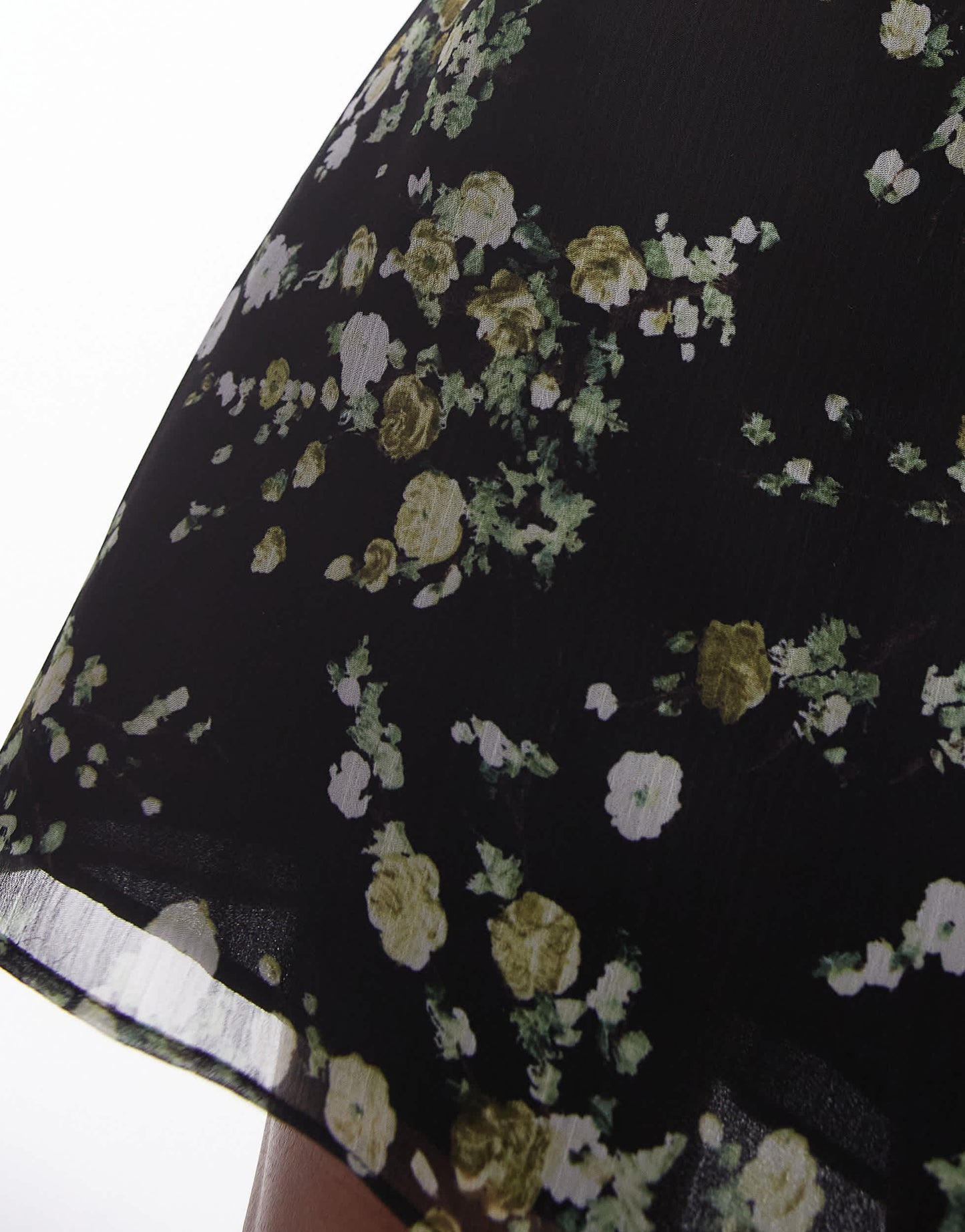Topshop georgette mini skirt in black based ditsy