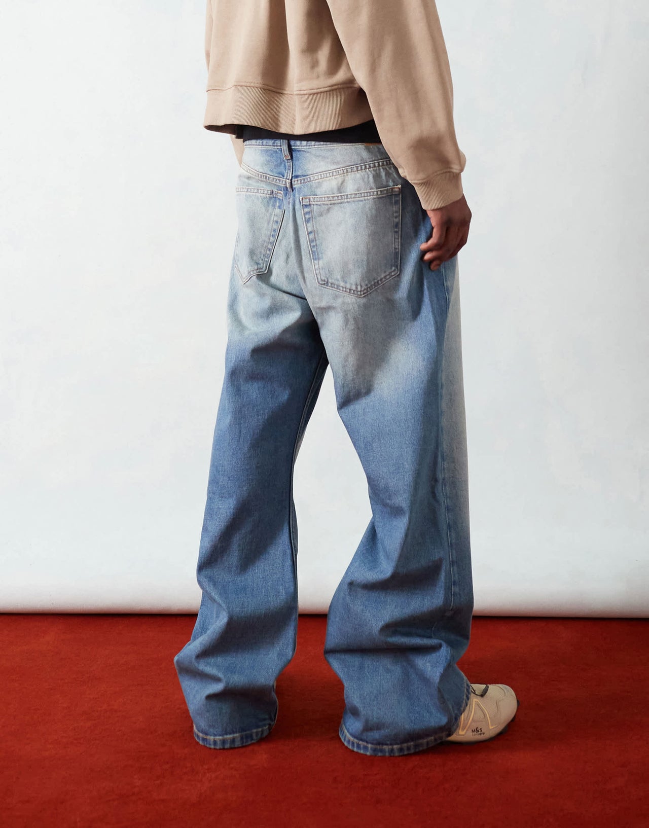 Weekday Time loose fit bootcut jeans in streaky blue wash
