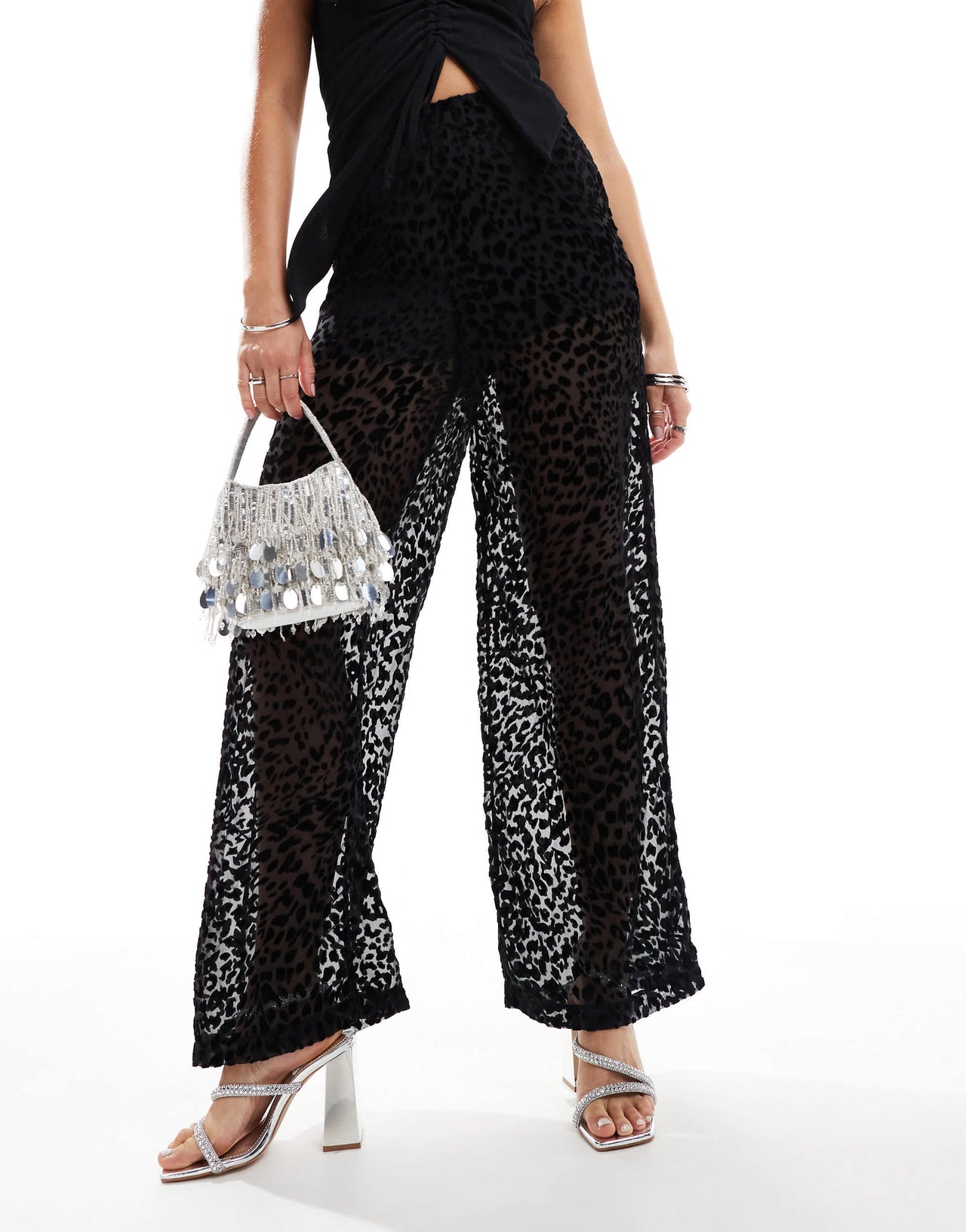 ASOS DESIGN sheer pull on trousers in black burnout animal print