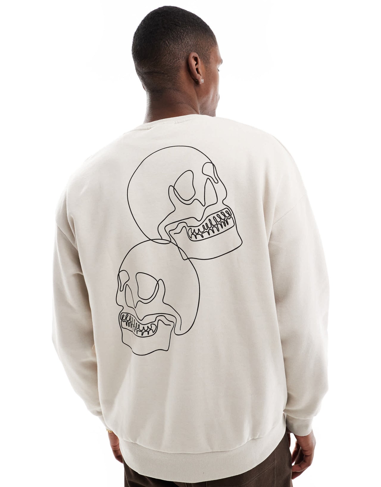 Jack & Jones drop shoulder crew neck sweat with skull back print in beige