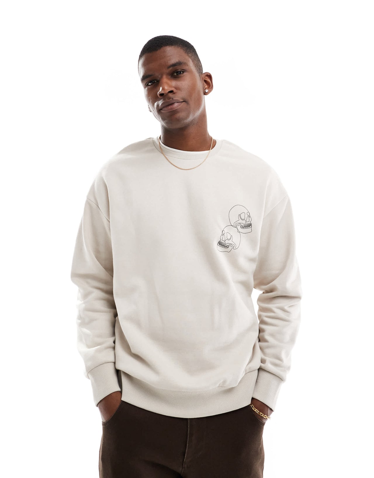 Jack & Jones drop shoulder crew neck sweat with skull back print in beige