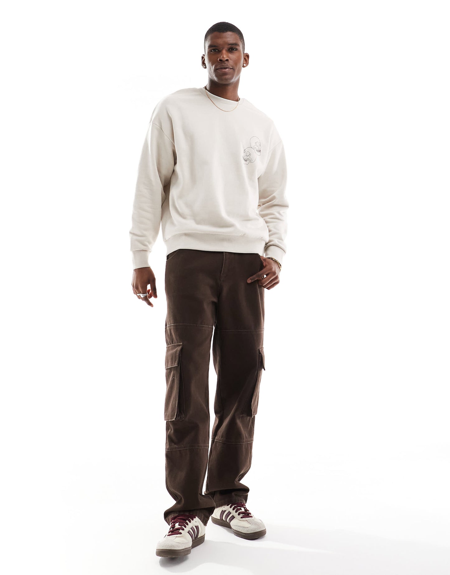 Jack & Jones drop shoulder crew neck sweat with skull back print in beige
