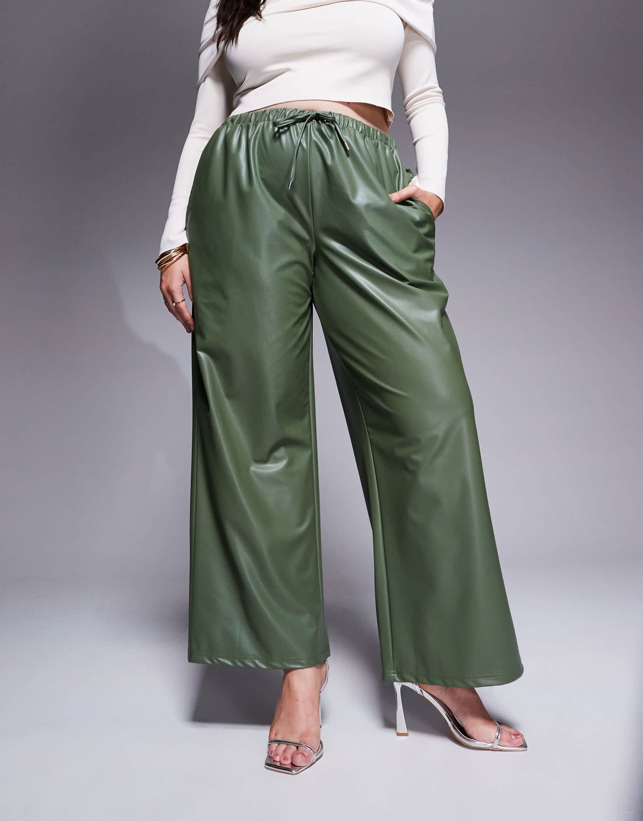 ASOS DESIGN Curve leather look tie waist wide leg trousers in green