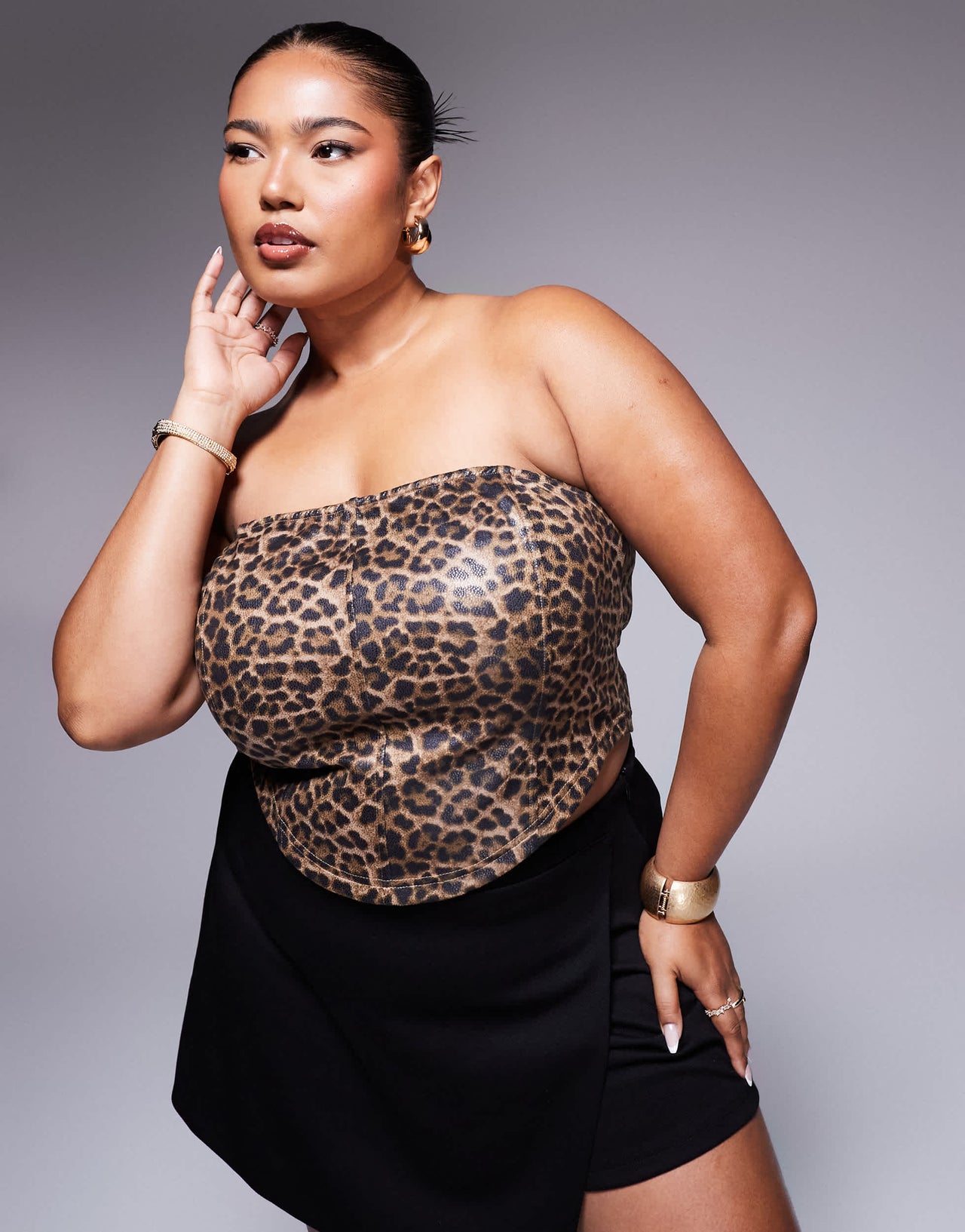 ASOS DESIGN Curve leather look corset top in leopard