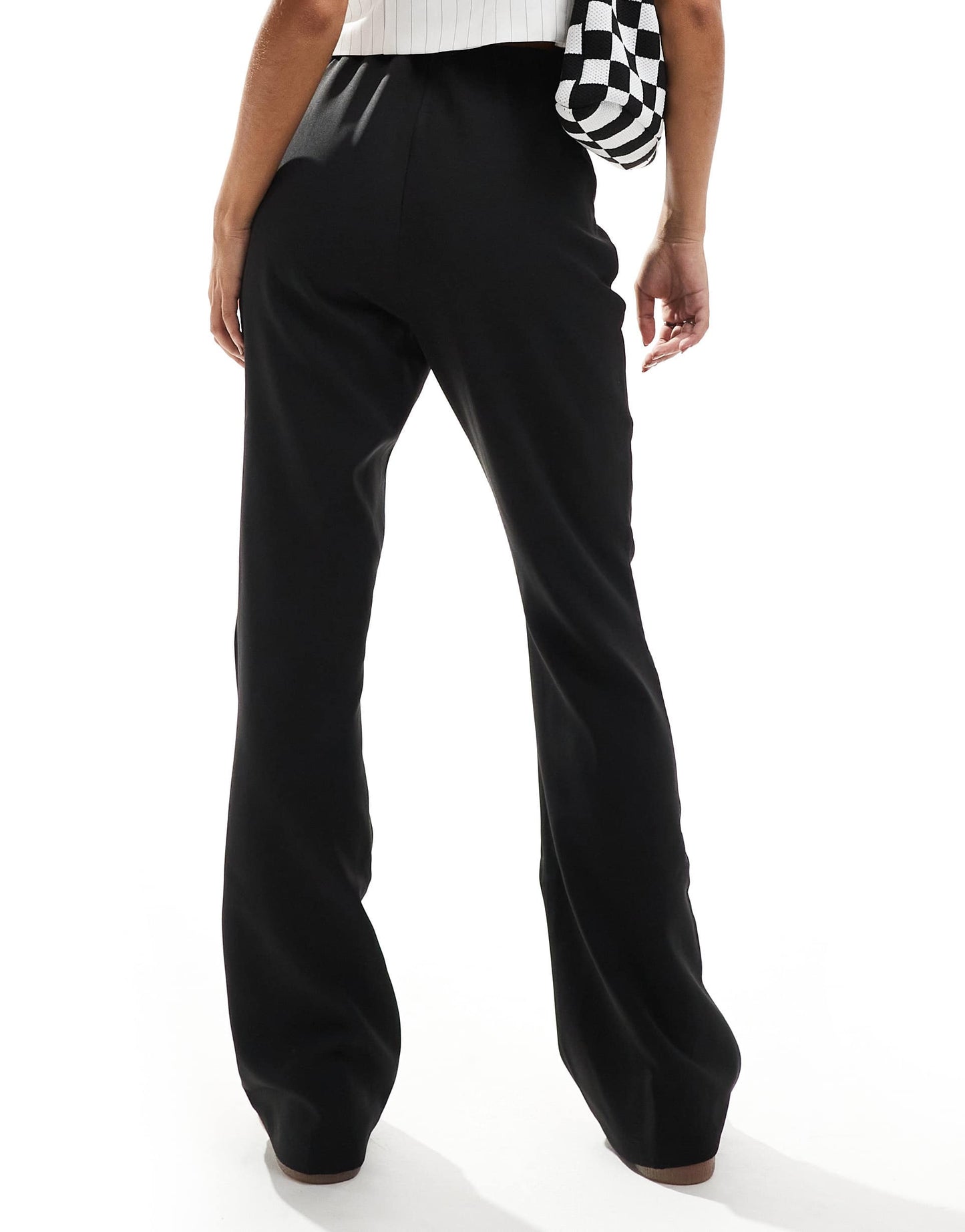 Vero Moda pleat front slim flare trousers in black