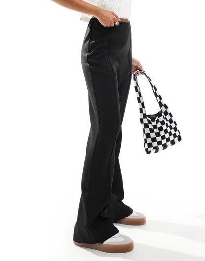 Vero Moda pleat front slim flare trousers in black