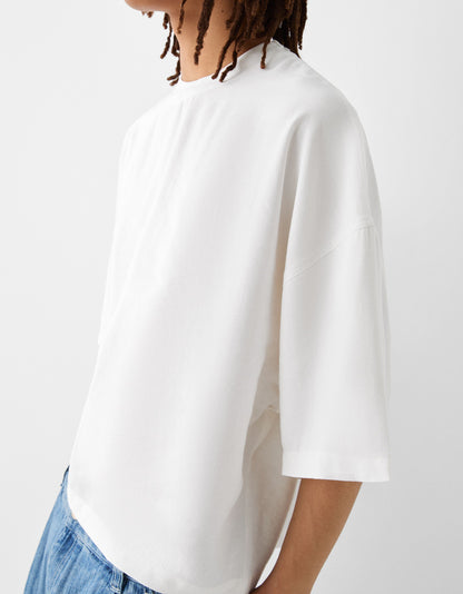 Bershka Collection cropped oversized t-shirt in ecru