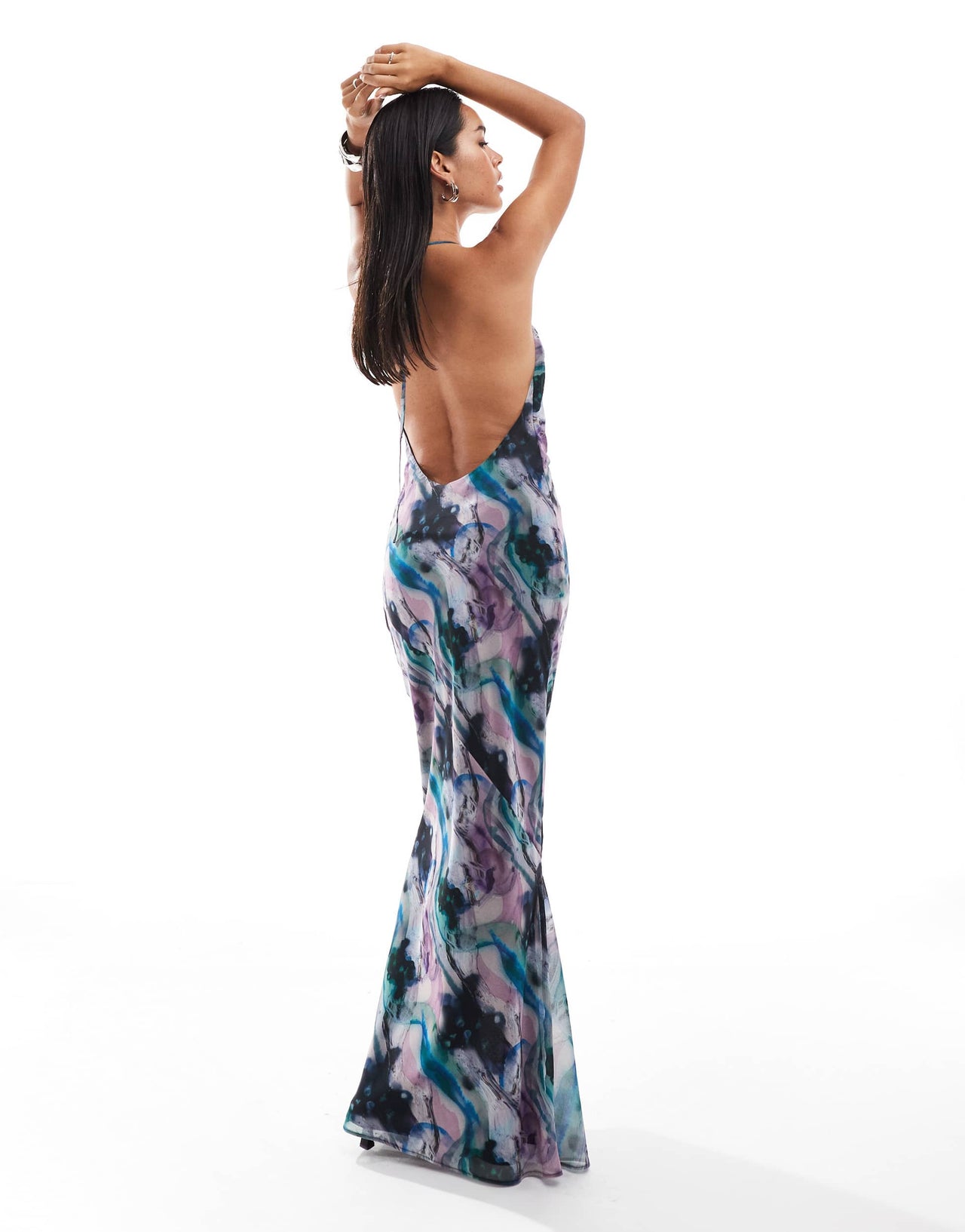 ASOS DESIGN cowl halter neck bias maxi dress with assymetric hem detail in blurred abstract print