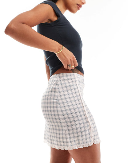 Monki mini satin lace skirt in pink check