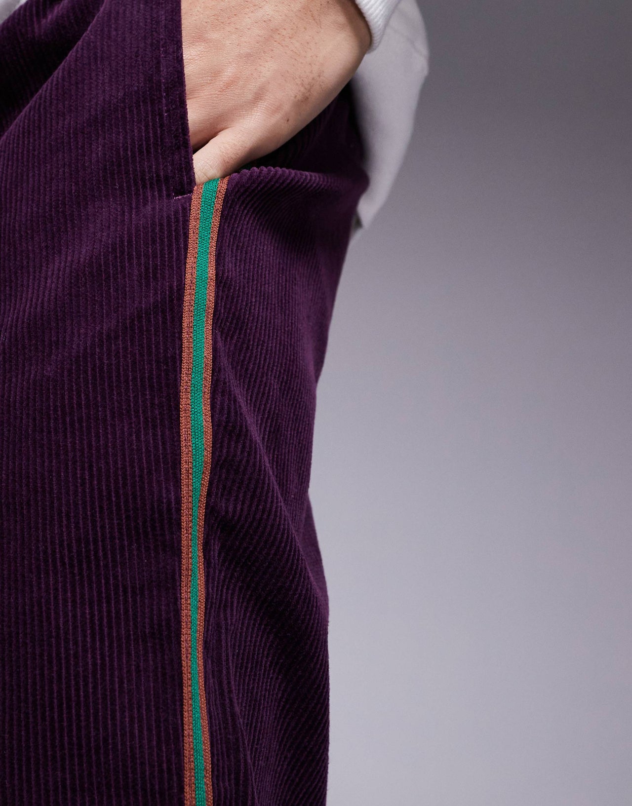 ASOS DESIGN pull on trouser in purple cord with stripe detail