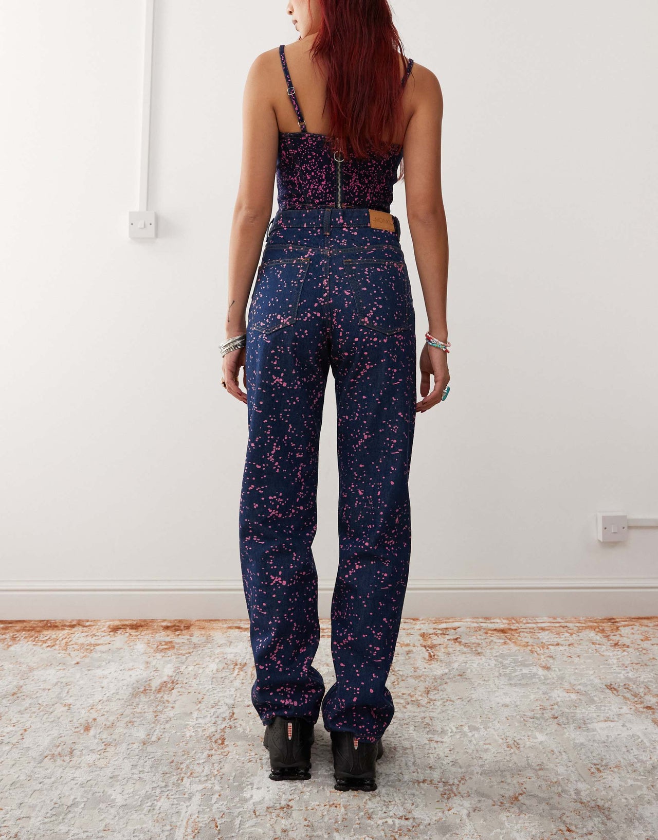 Monki co-ord Aimo straight leg jeans in dark blue with pink paint splatter print