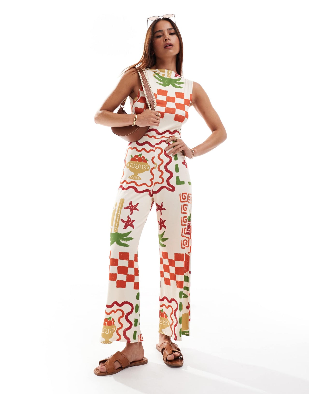 ASOS DESIGN  slash neck culotte jumpsuit with open tie back in postcard print