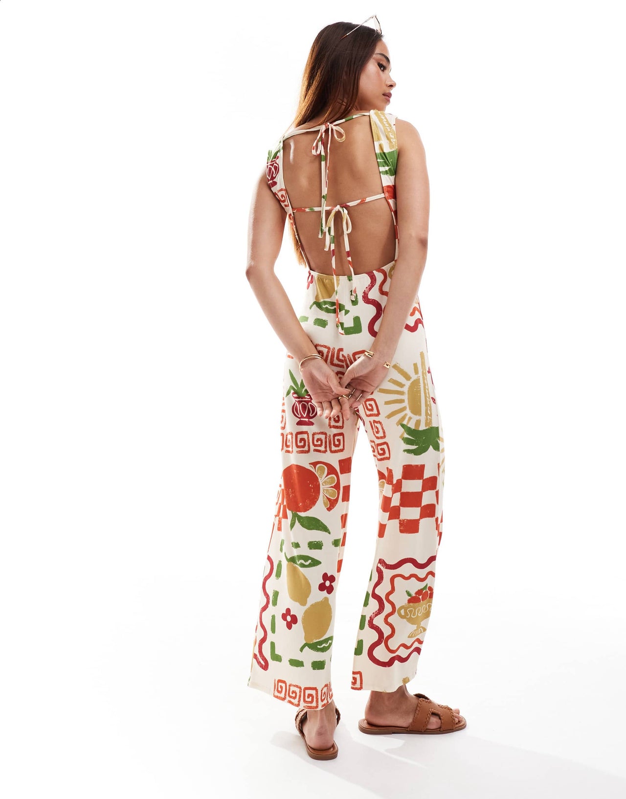 ASOS DESIGN  slash neck culotte jumpsuit with open tie back in postcard print