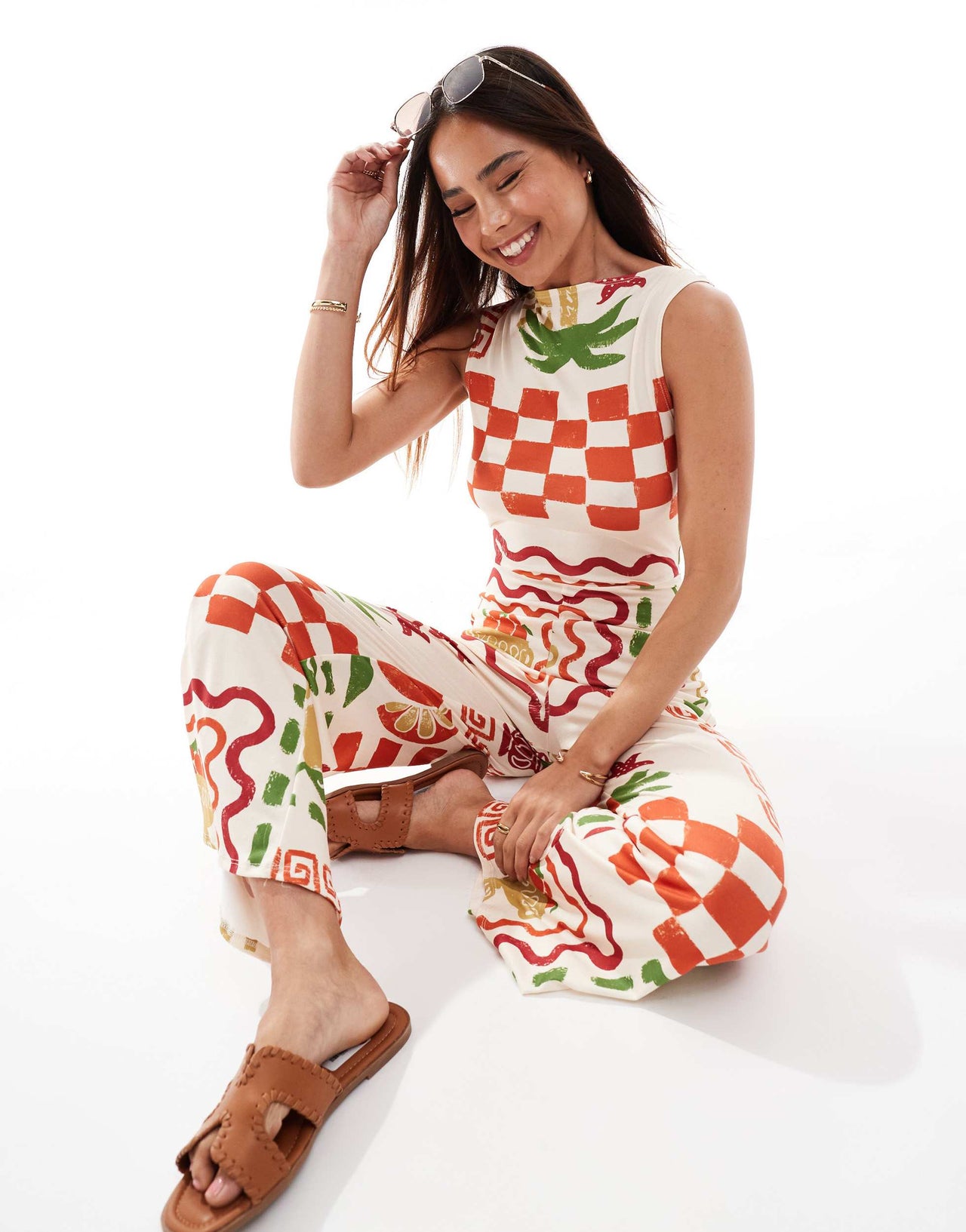ASOS DESIGN  slash neck culotte jumpsuit with open tie back in postcard print