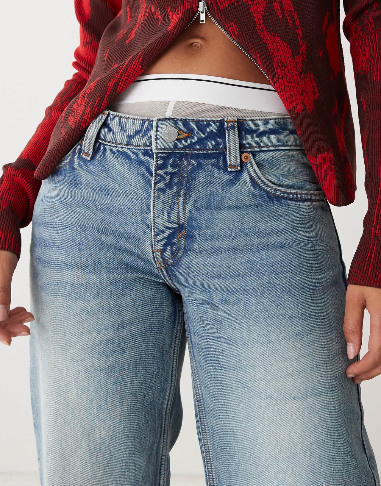 Monki Imoo low waisted wide fit jeans in mid blue