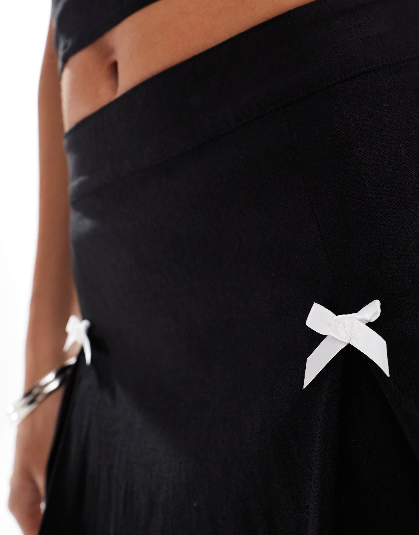 Motel ropita bow detail pleated mini skirt co-ord in black