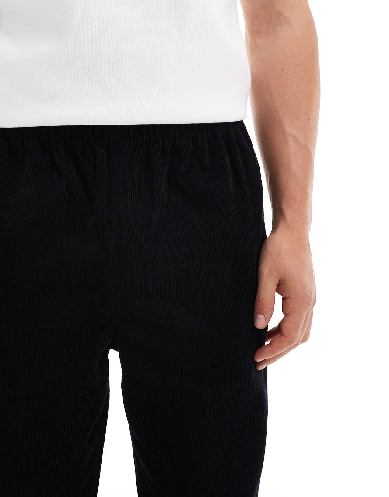 ASOS DESIGN baggy cord trousers with side taping in black