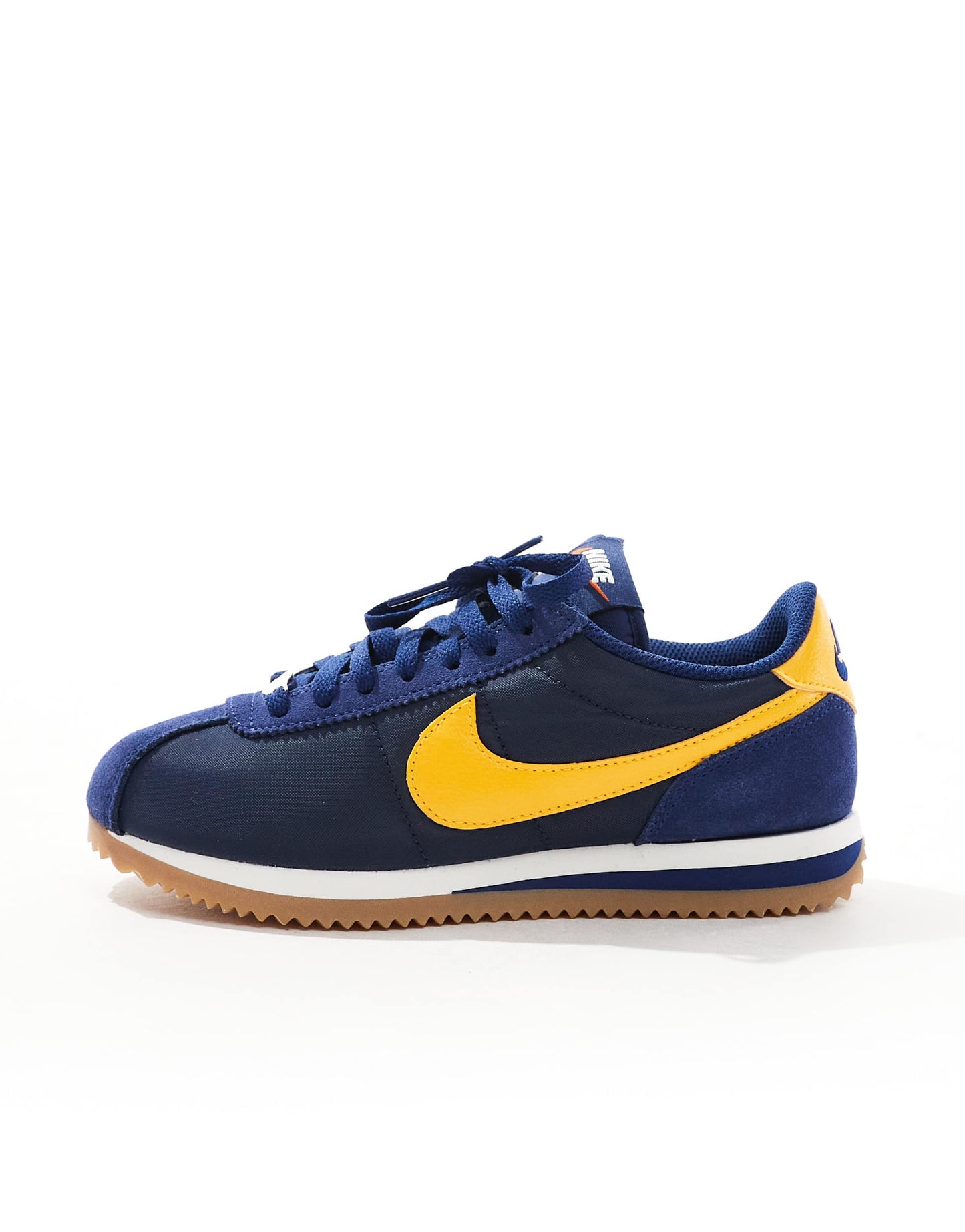 Nike Cortez trainers in navy and yellow