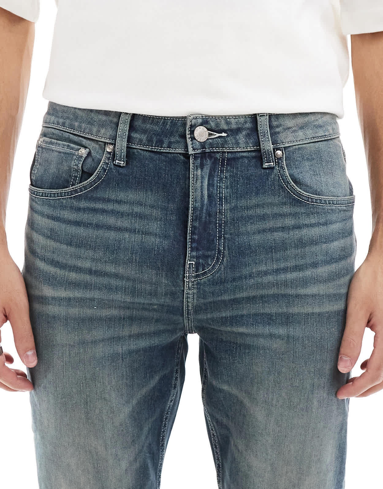 ASOS DESIGN skinny jeans with green tint in light wash blue