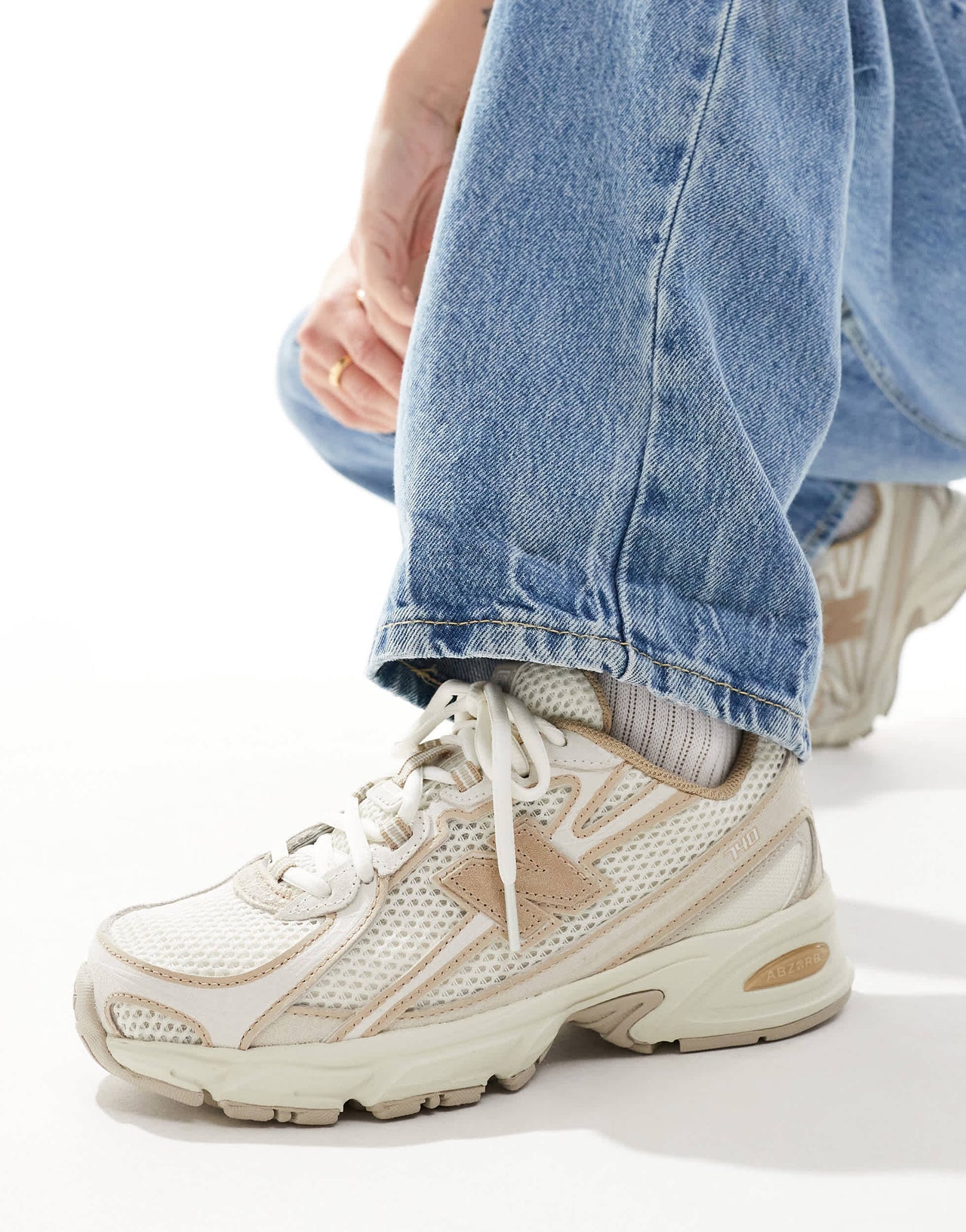 New Balance 740 trainers in beige and tan