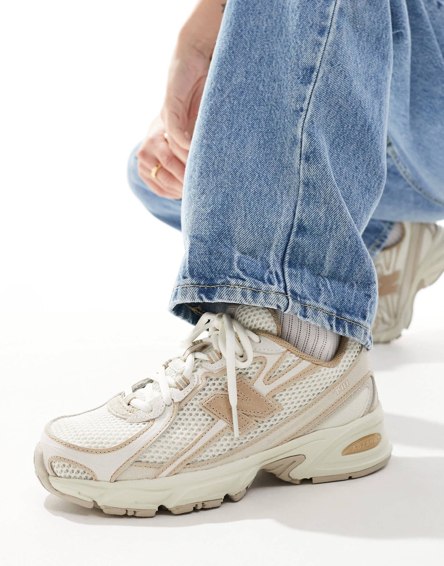 New Balance 740 trainers in beige and tan