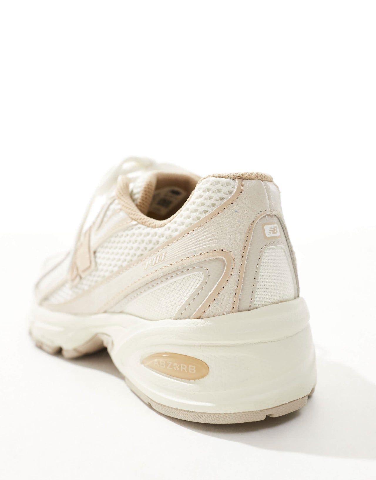 New Balance 740 trainers in beige and tan