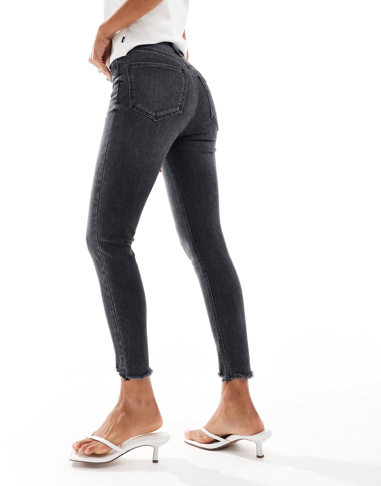 Stradivarius super skinny jean with frayed hem in washed black