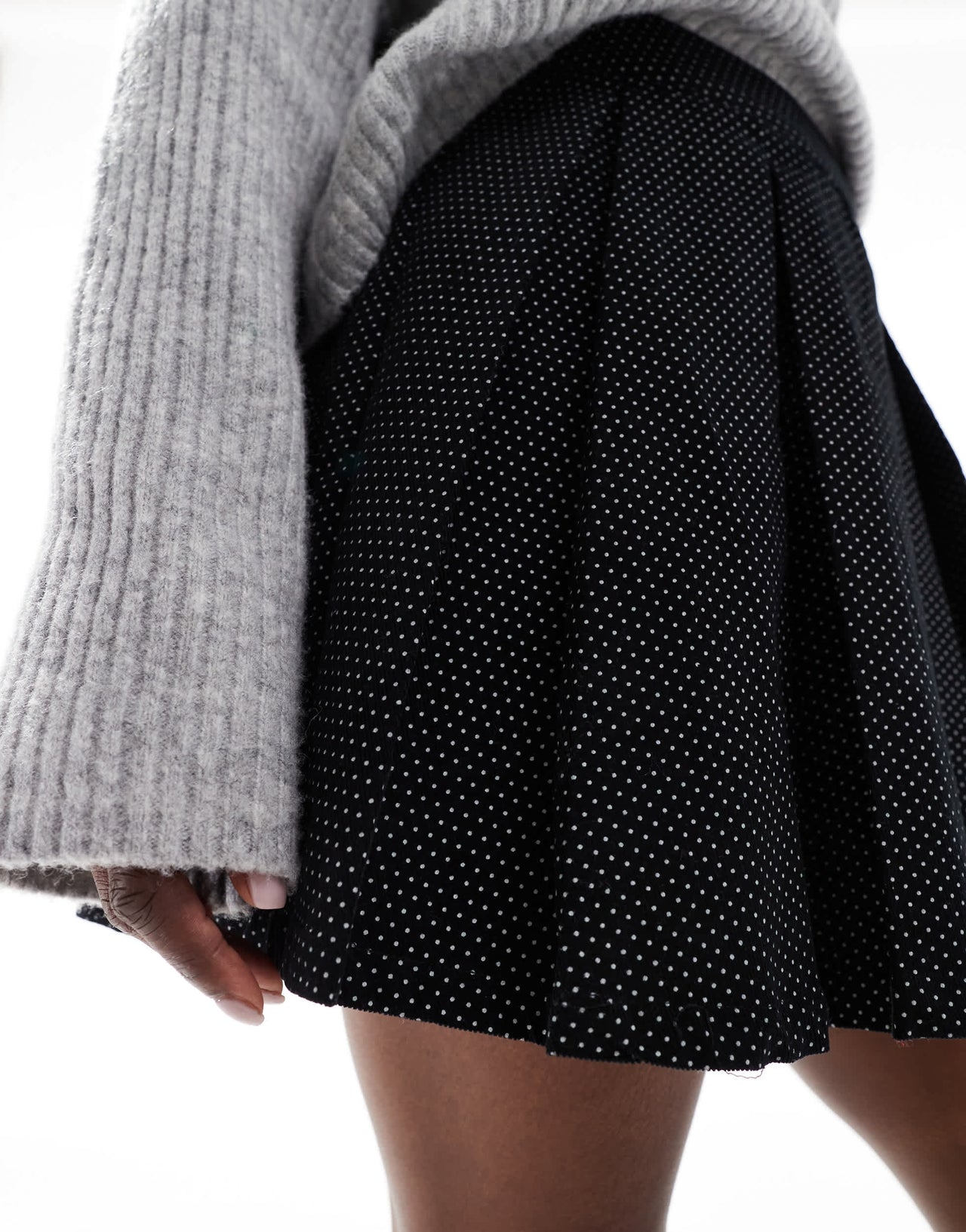 Wednesday's Girl pleated polka dot cord mini skirt in black
