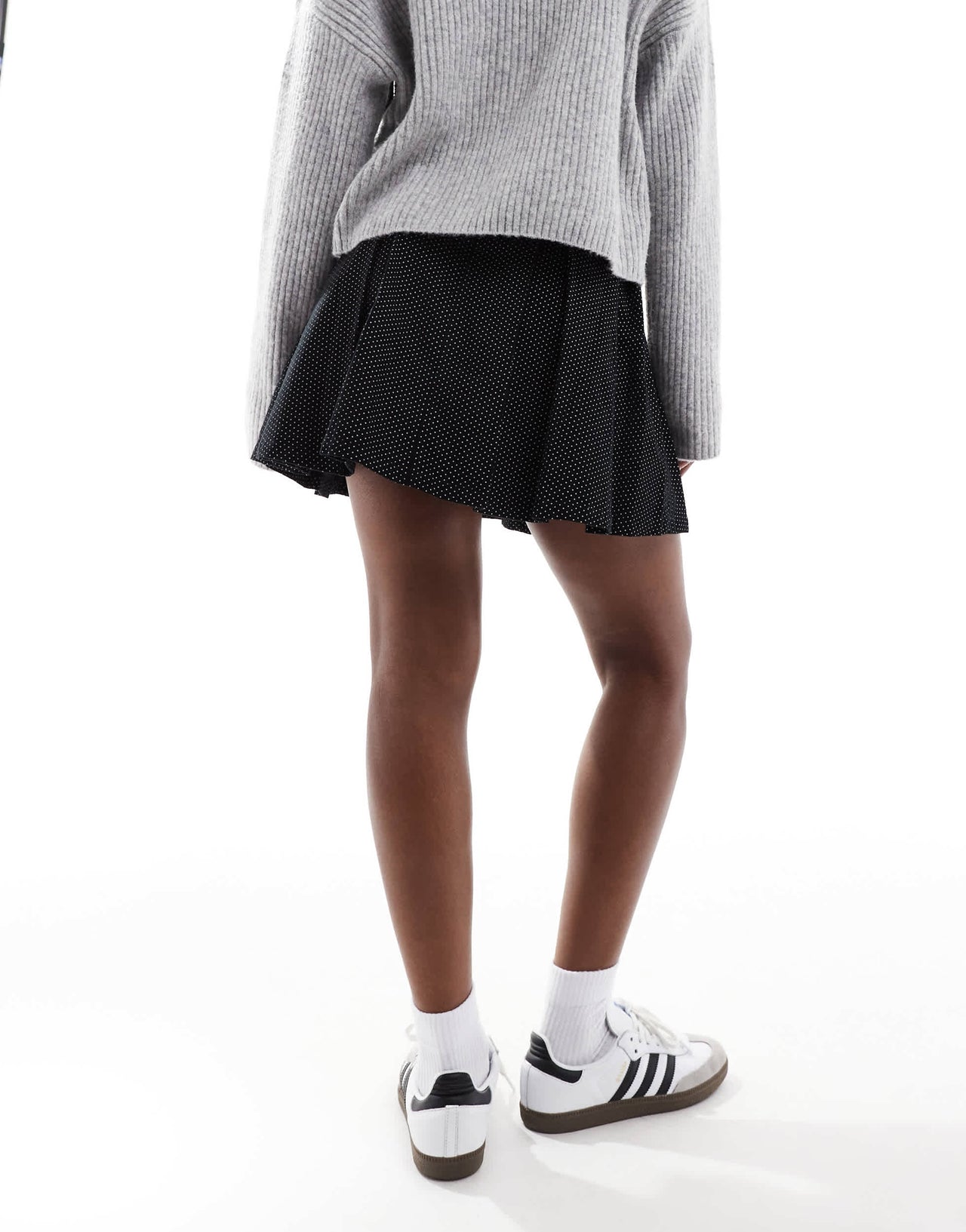 Wednesday's Girl pleated polka dot cord mini skirt in black