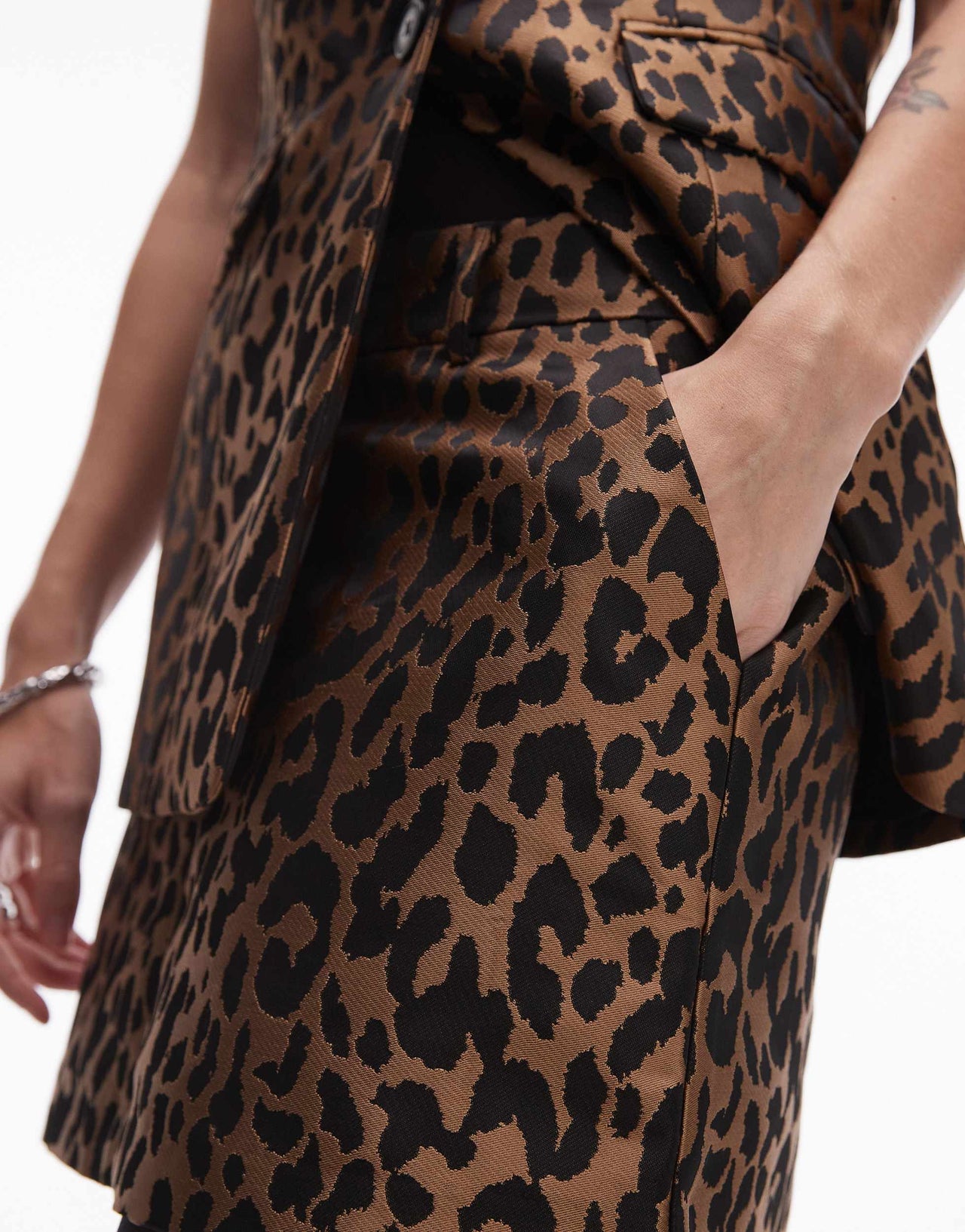 Topshop jacquard leopard pelmet mini skirt in bronze/gold