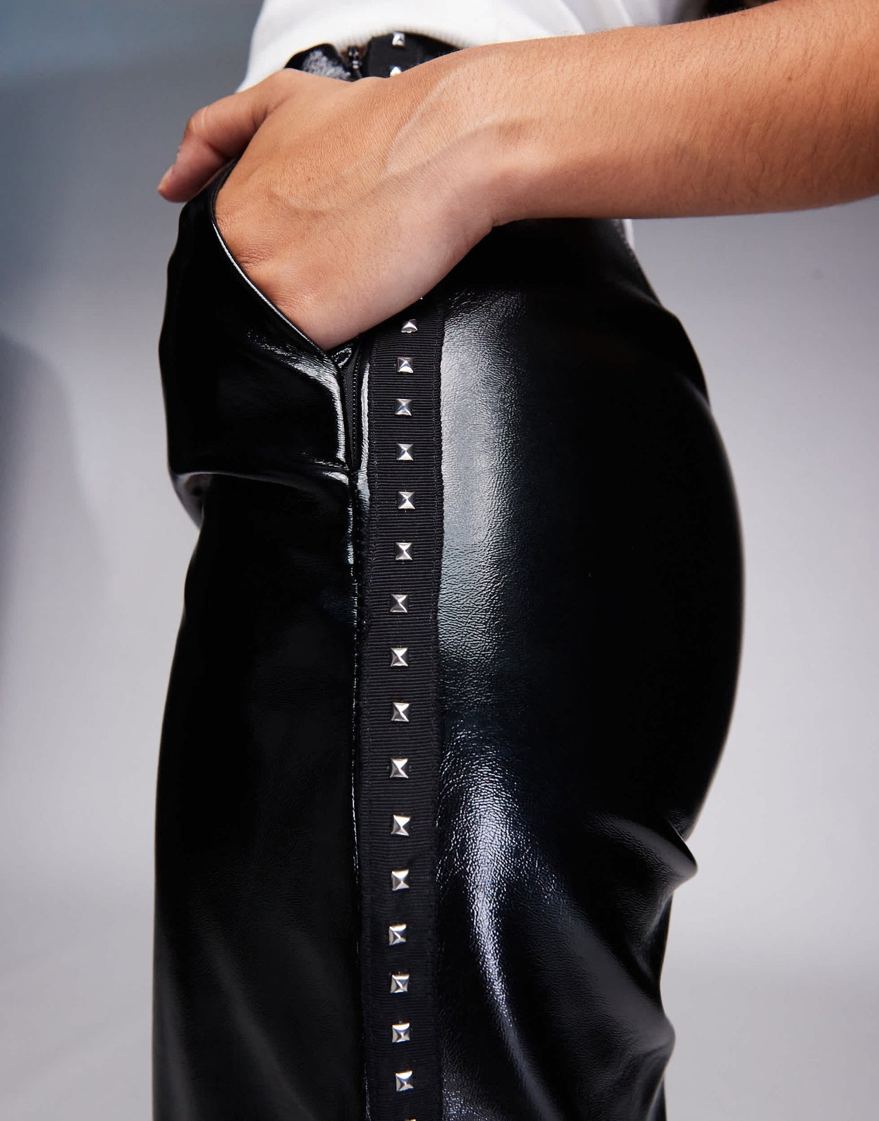 ASOS DESIGN high shine leather look straight leg trouser with stud detail in black