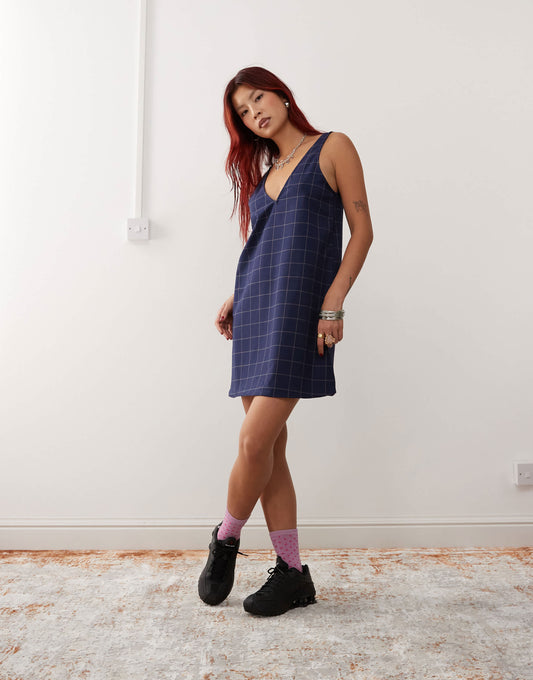 Monki pinafore mini dress in navy check pinstripe