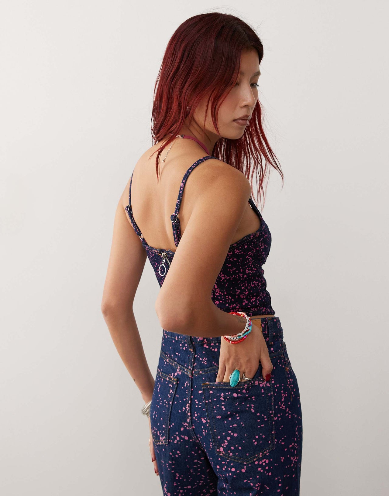 Monki co-ord denim corset top in dark blue with pink splatter paint print