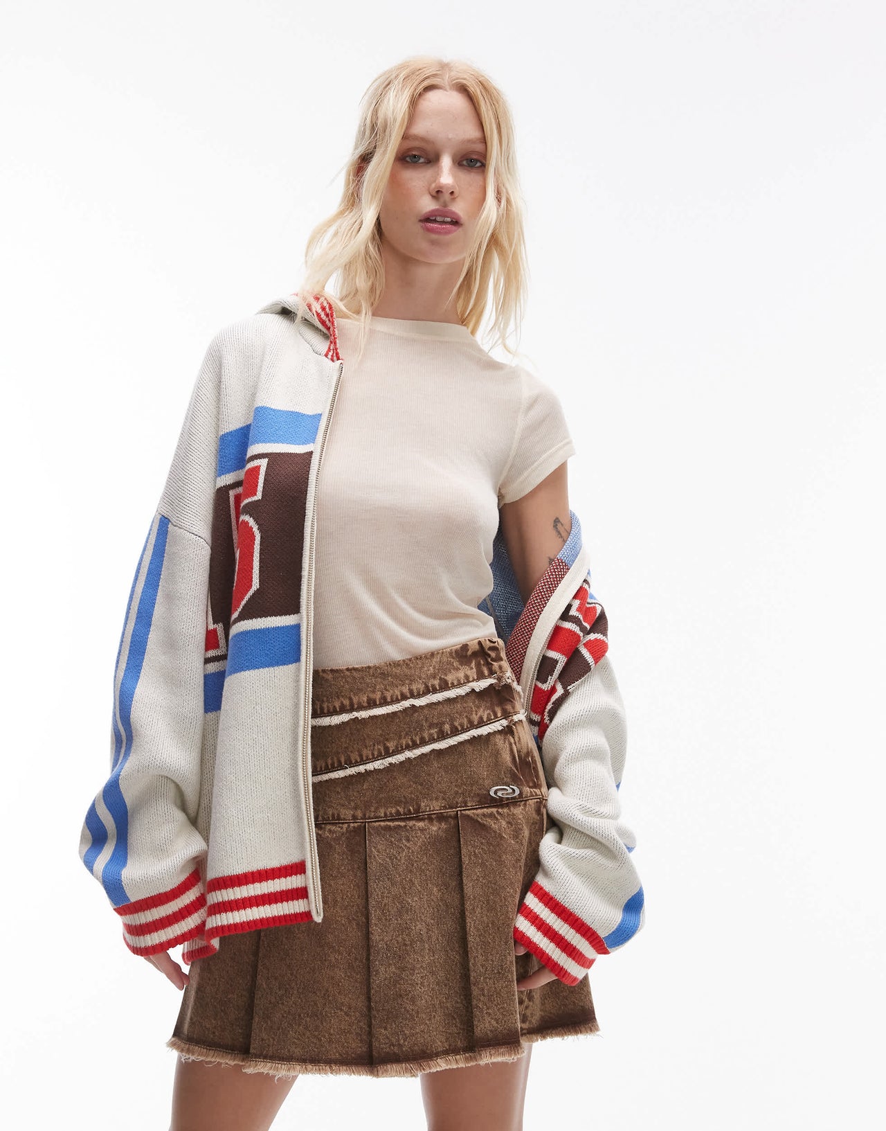 Resume pleated mini skirt in distressed brown denim with fraying