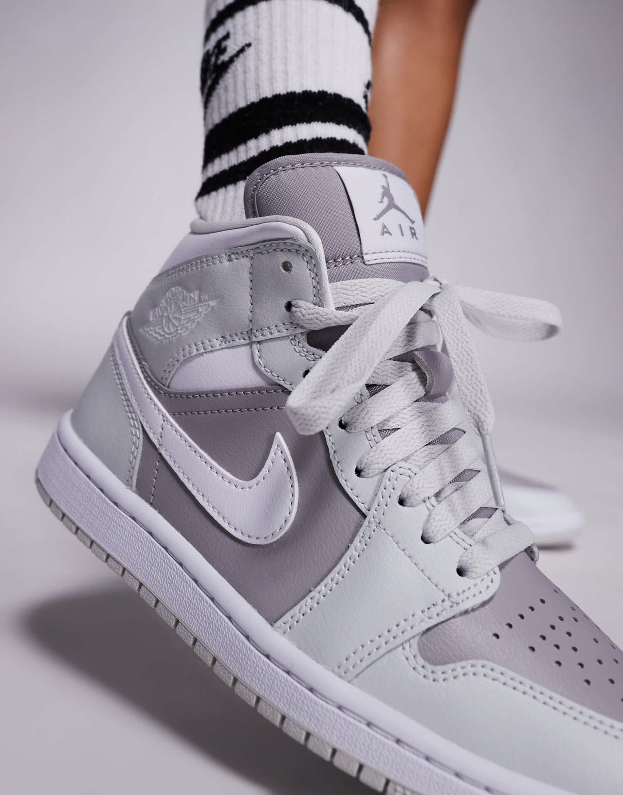 Nike Air Jordan Mid 365 trainers in grey and white