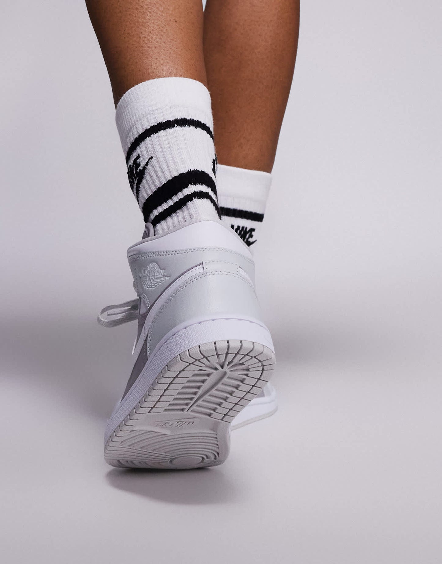 Nike Air Jordan Mid 365 trainers in grey and white