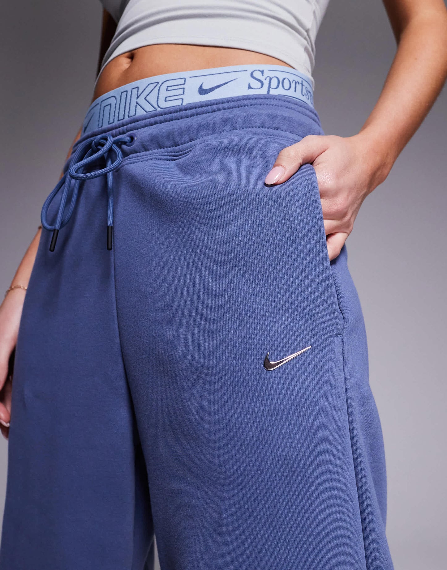 Nike Phoenix Fleece Gym Life Swoosh wide leg joggers with boxer detail in blue